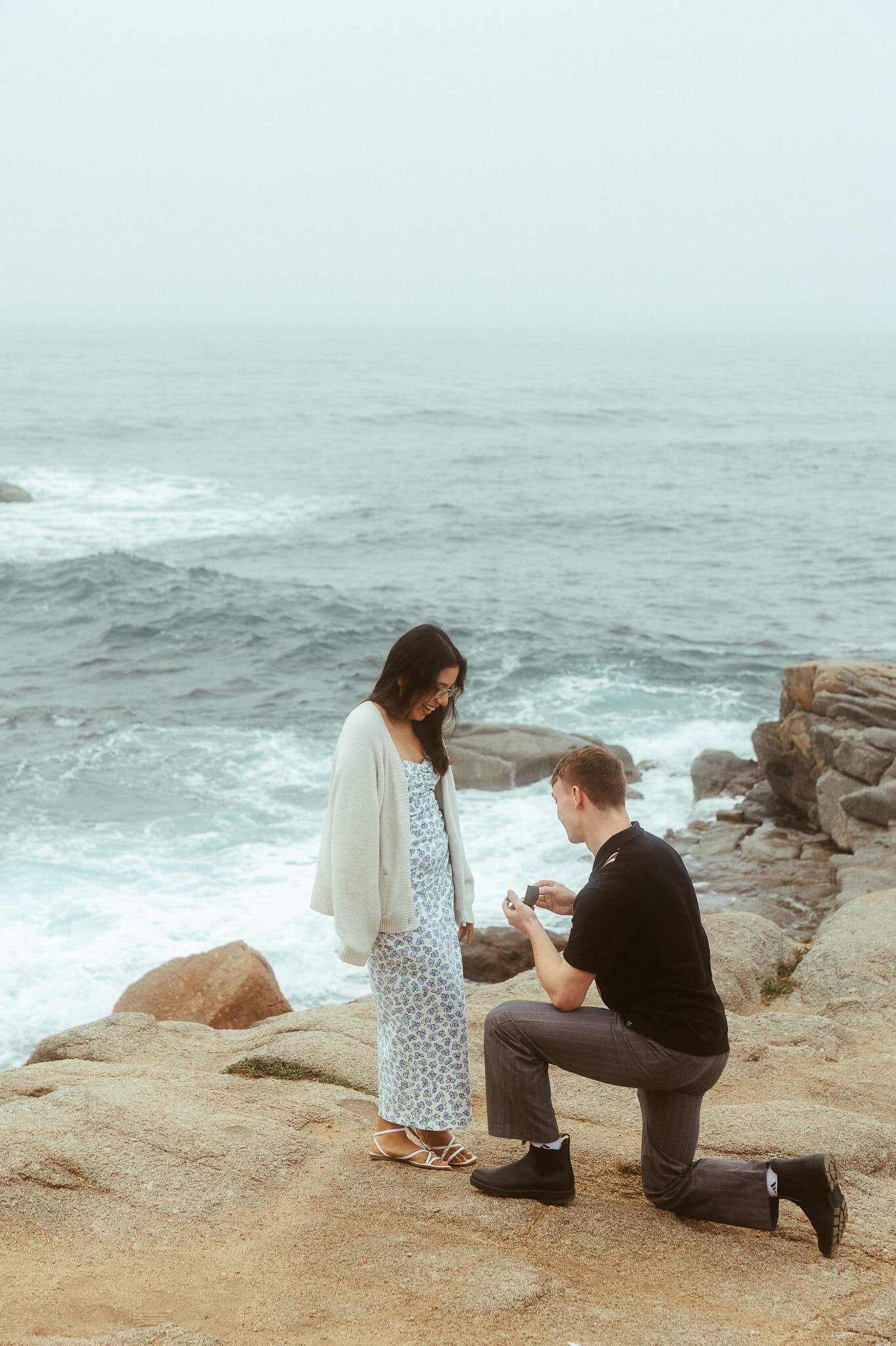 Surprise proposal photo session on the cliffs of costa brava