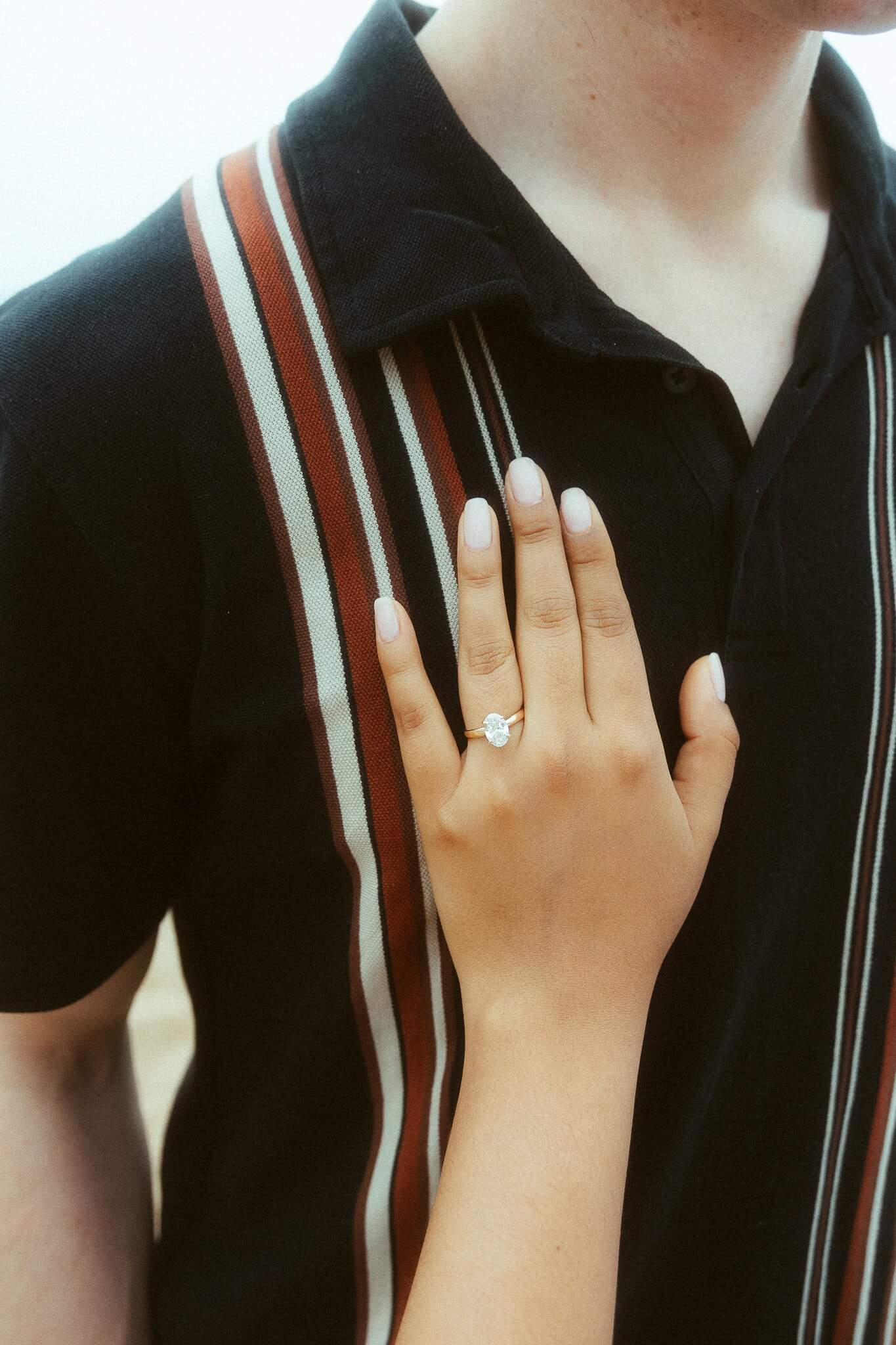 Surprise proposal photo session on the cliffs of costa brava
