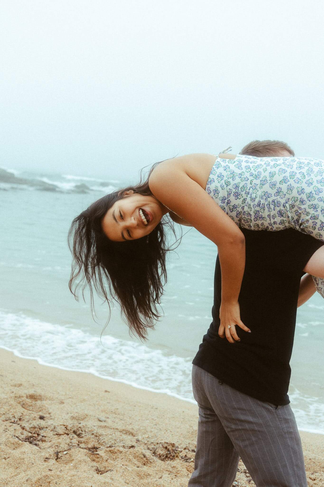 Surprise proposal photo session on the cliffs of costa brava