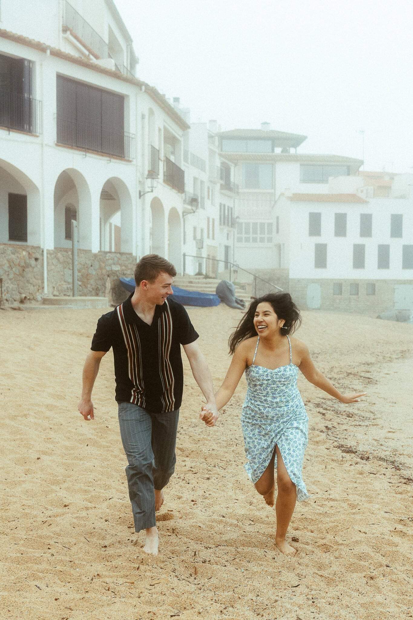 Surprise proposal photo session on the cliffs of costa brava