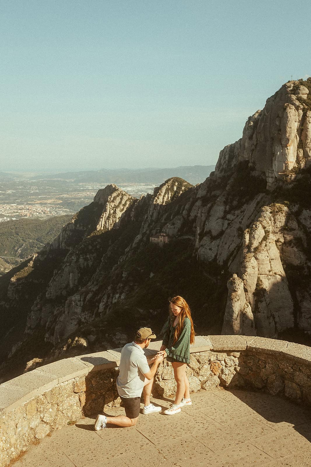 Woman's emotional reaction during surprise proposal at Montserrat