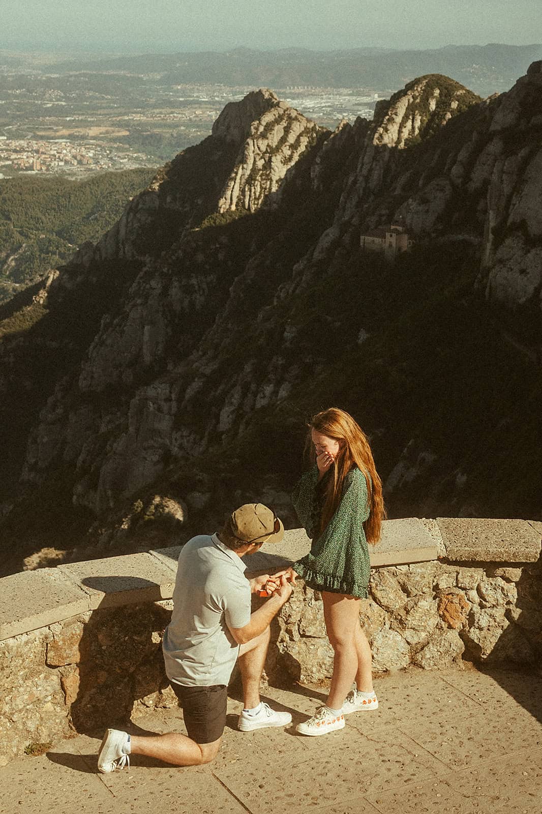 Woman's emotional reaction during surprise proposal at Montserrat